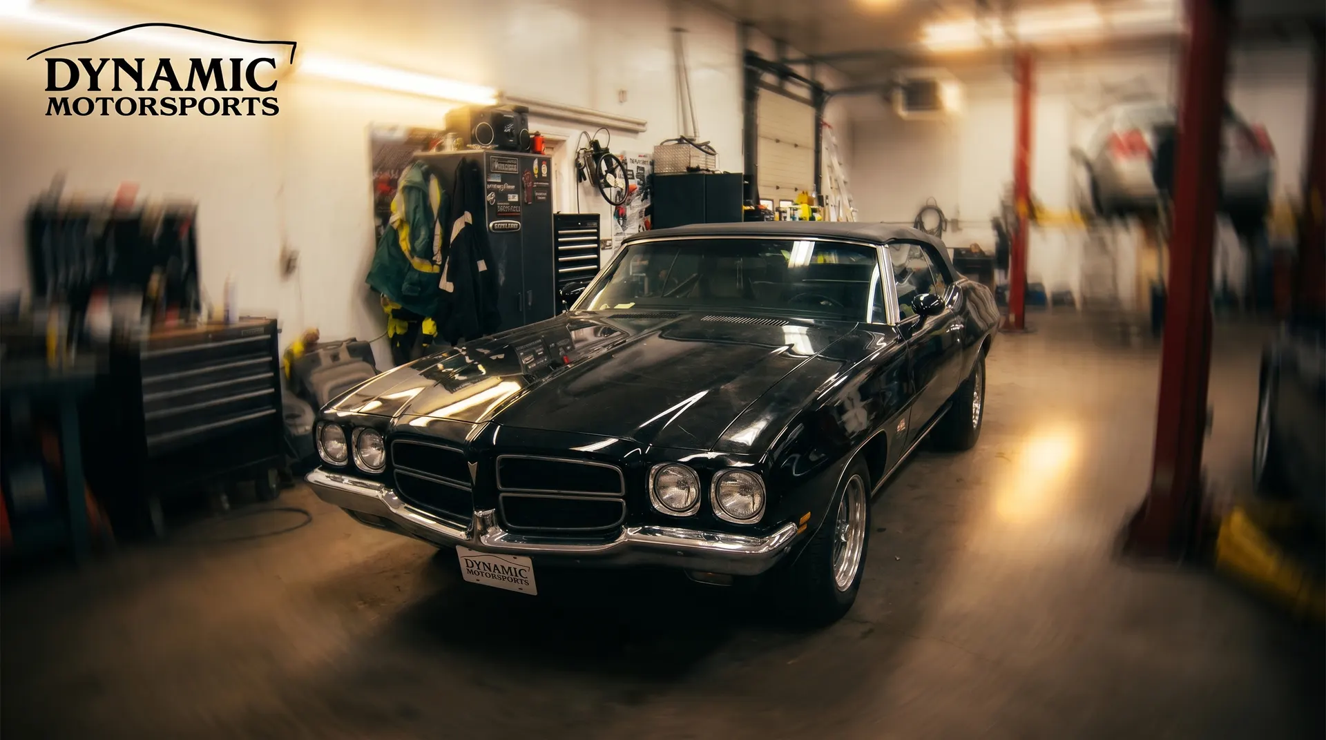 Dynamic Motorsports garage — a classic muscle car in the Moncton shop